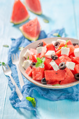 Juicy watermelon salad with feta cheese and black olives