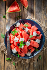 Juicy watermelon salad with black olives and feta cheese
