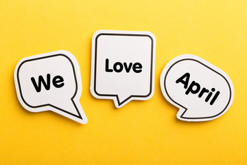 April Speech Bubble Isolated On Yellow