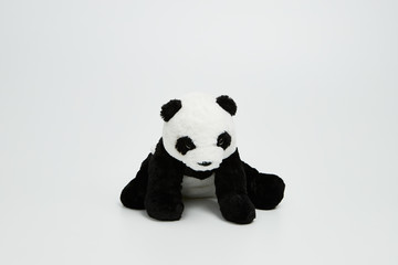 Cute panda doll isolated on white background. (with free space for text)  © Leejeongjin