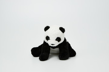 Cute panda doll isolated on white background. (with free space for text)  © Leejeongjin