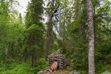 SOLOVKI, REPUBLIC OF KARELIA, RUSSIA - JUNE 27, 2018: Memorial cross in the Holy Ascension skete under the Sekirnaya mountain. The Solovetsky Monastery. Solovki Islands, Arkhangelsk region, White Sea © Konstantin