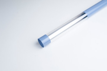 Wrapping roll of blue florist's film for packing flowers, bouquets on a white background