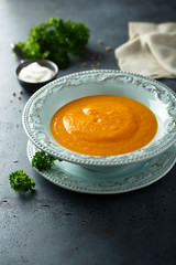 Homemade pumpkin soup with cream