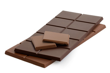 Two squares of milk chololate on top of dark chololate and milk chocolate bars. Isolated on white.
