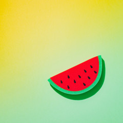 Watermelon slice with strong fashion shadow on gradient background. Creative concept of luxury relax with fruit on the beach.  Minimalism