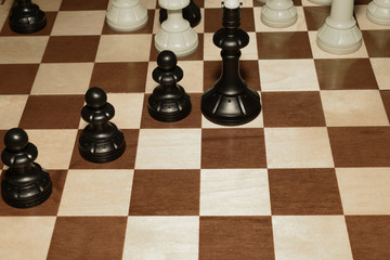Chessboard and the chessmen as a game background