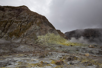 Sulphur Fumeroles and hot mud springs on edge of crater - White Island, New Zealand