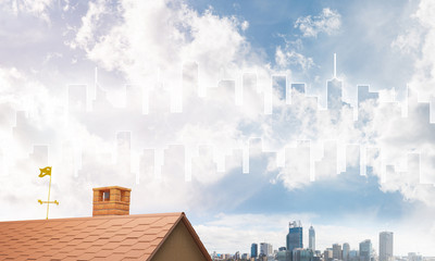 Concept of real estate and construction with drawn silhouette on big city background