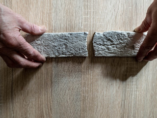 The Separation of the stone by hand. Stone in half.