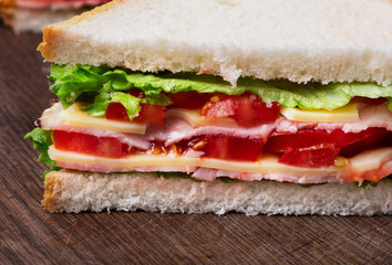 close-up of sandwich on wooden background