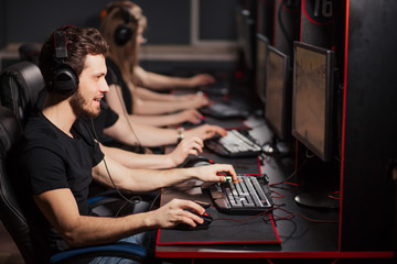 Leading esport team mousesports training together in a e-sport club getting prepared to online Cyber Games Tournament and have all chances to beat their opponents in upcoming contest. © alfa27