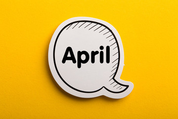 April Speech Bubble Isolated On Yellow
