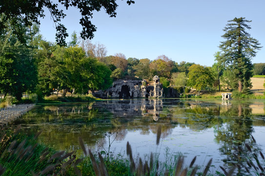 Lake and caves inside the park of Majolan, Blanquefort, France