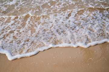 Sandy shore, tide close-up - top view