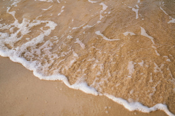Sandy shore, tide close-up