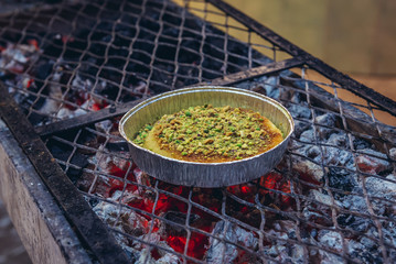 Kunafa sweet cake prepared in pastry shop in Wadi Musa, Jordan