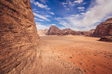 Fototapeta na wymiar Aerial view from a rocks above so called Lawrence Haouse in Wadi Rum also known as Valley of light or Valley of sand in Jordan