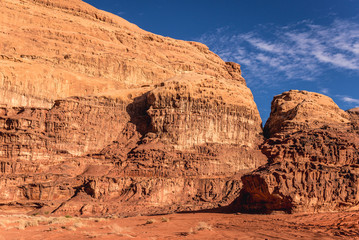 Reddish rocks in Wadi Rum valley in Jordan