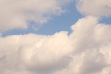 White clouds against the blue sky.