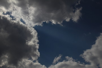 White clouds against the blue sky.