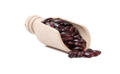 red kidney bean in wooden scoop isolated on white background. nutrition. food ingredient.