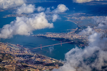 Lisbon city over Tagus river - view with Ponte 25 de Abril bridge, Portugal