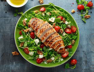 Fresh Grilled Chicken salad with tomatoes, feta cheese and vegetables