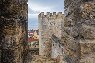 Fototapeta na wymiar Walls of Saint Gorge Castle in Lisbon, capital city of Portugal