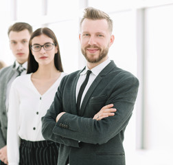 businessman and his business team standing in the office