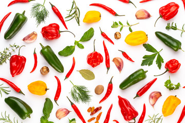 Spice herbal leaves and chili pepper on white background. Vegetables pattern. Floral and vegetables on white background. Top view, flat lay.