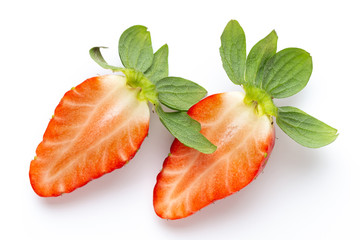 Ripe half strawberry isolated on white background.
