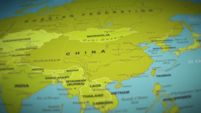 World Map Flight Over Background/ 4k animation of a world map travel background flight over with ocean, countries and cities names