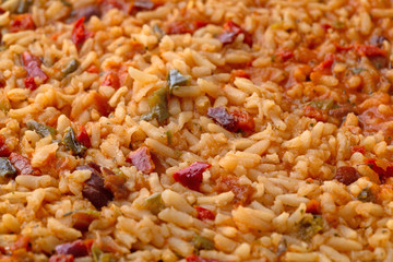 Cooked Mexican rice and beans in a skillet close view