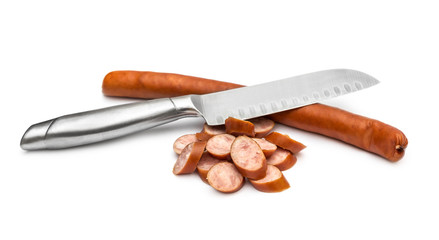 Thin smoked sausage, cutted pieces of thin sausage and knife on white.