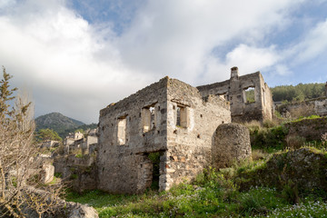 Fototapeta premium The abandoned Greek Village of Kayakoy, Fethiye, Turkey. Old greek houses, kaya koy near Mediterranean coast.