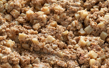 Close view of cold hash and sausage in a frying pan