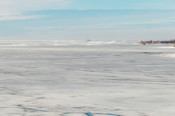 Kronshtadt. Tolbukhin lighthouse in the Gulf of Finland. Ice hummocks.