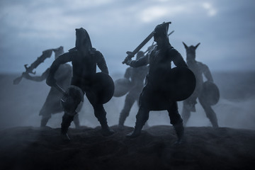 Medieval battle scene with cavalry and infantry. Silhouettes of figures as separate objects, fight...