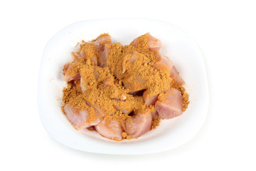 Piece of raw chicken meat on a white background