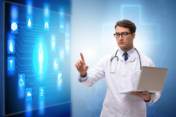 Doctor in telemedicine concept looking at screen