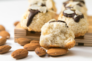 Coconut biscuits with almonds isolated on a white background, closeup