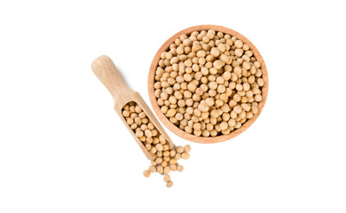 soy bean in wooden bowl and scoop isolated on white background. nutrition. food ingredient.