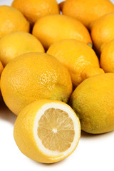 Ripe yellow lemon on table