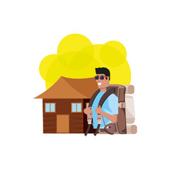 traveler man with travel bag and log cabin