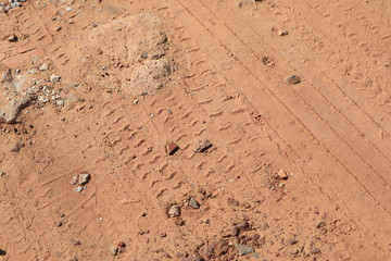 Close up the Dirt Road Texture with Tire Marks
