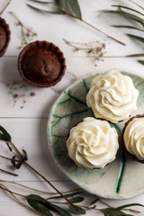 Sweet pastries, muffins and cupcakes on the table