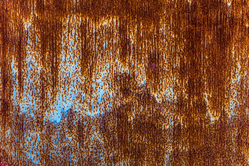 Peeling paint texture in abandoned home.