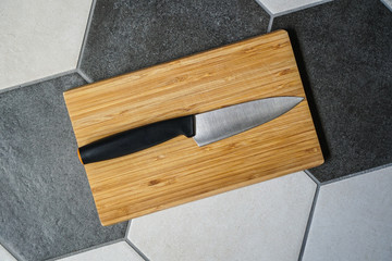 Wooden cutting board and knife