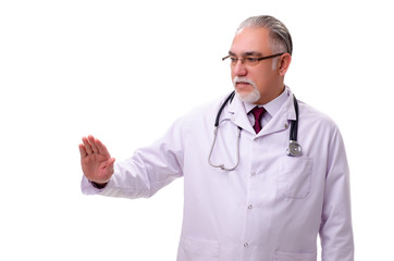 Old male doctor isolated on white 